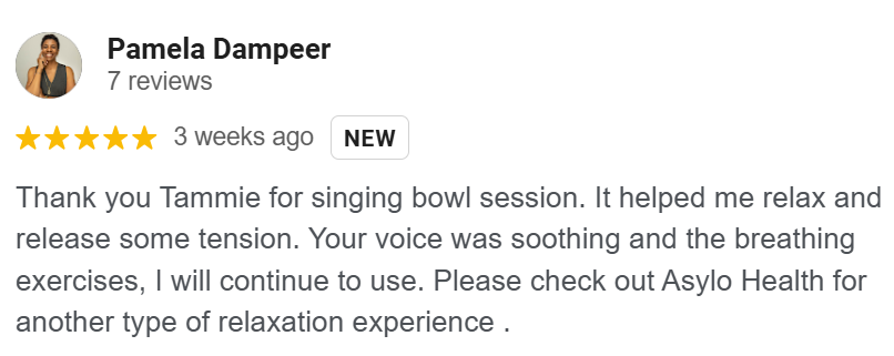 Screenshot of a customer review for a singing bowl session, praising the experience and recommending it.