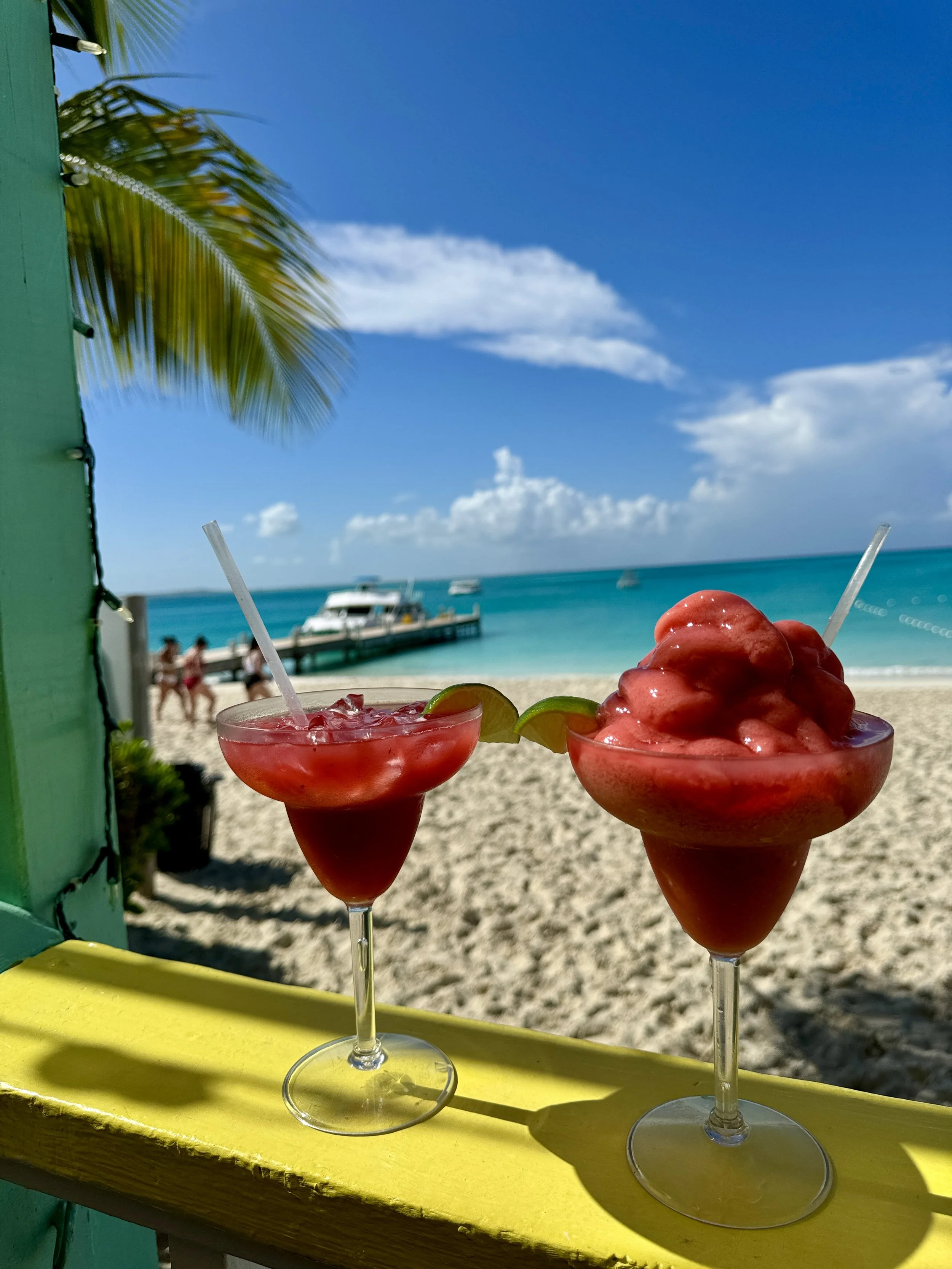 Frozen margaritas overlooking Grace Bay Beach in Turks and Caicos with turquoise water
