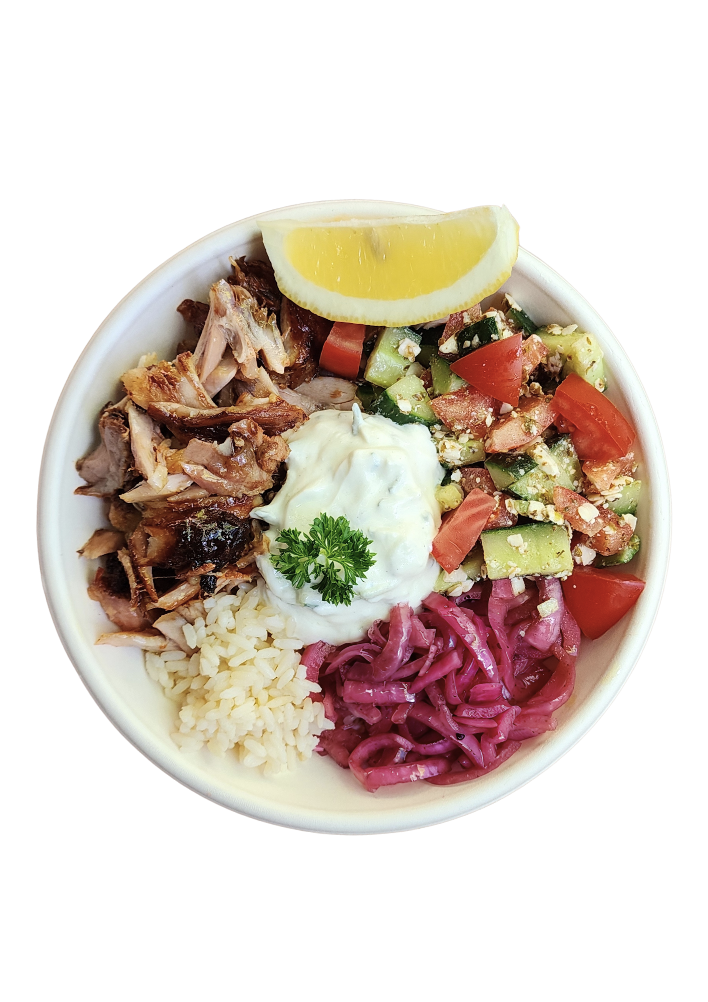 A bowl containing shredded chicken, white rice, red cabbage slaw, cucumber and tomato salad with feta cheese, a dollop of creamy sauce topped with parsley, a lemon wedge, and a sprig of parsley.