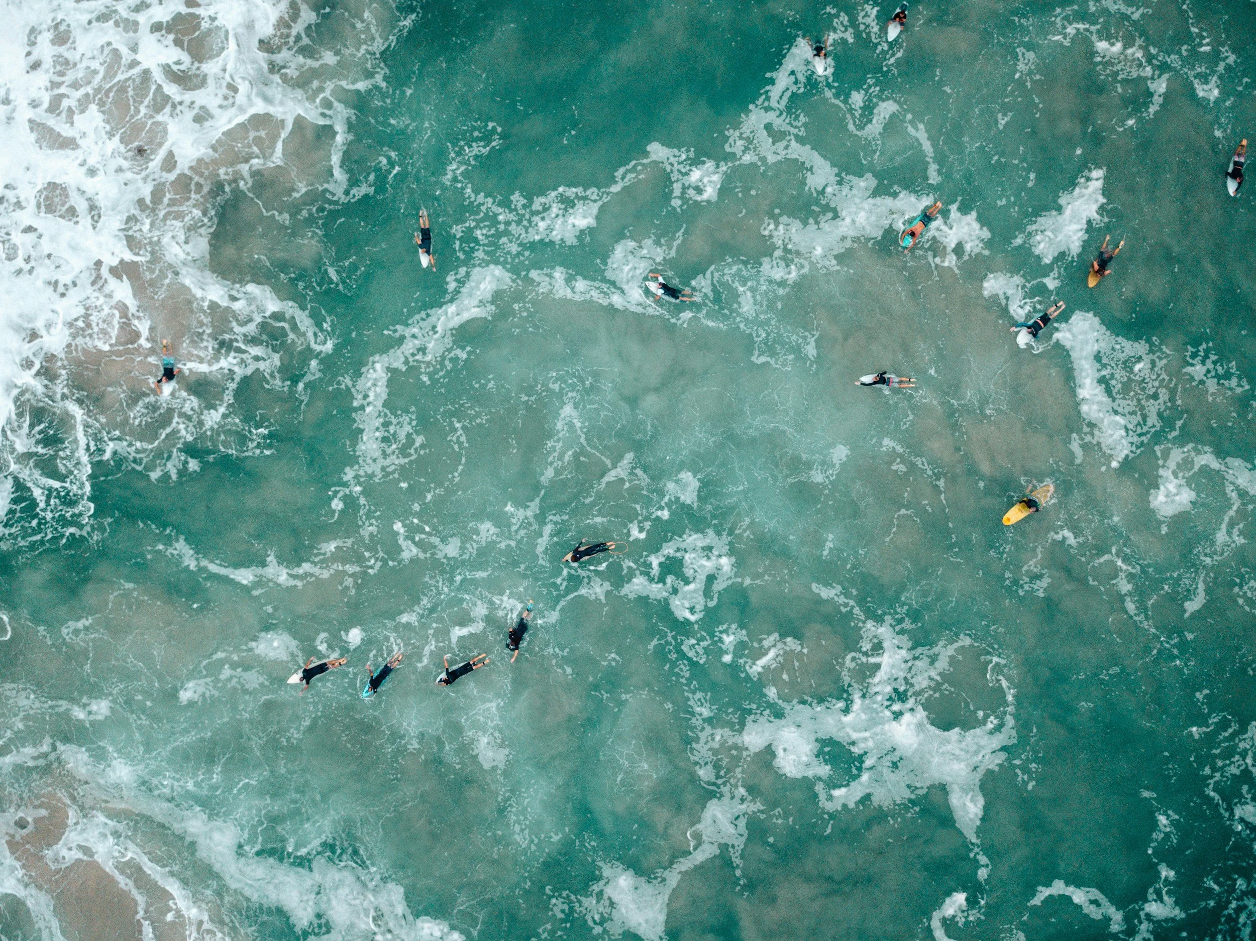 Surfers in the water on the Gold Coast, Queensland, Australia