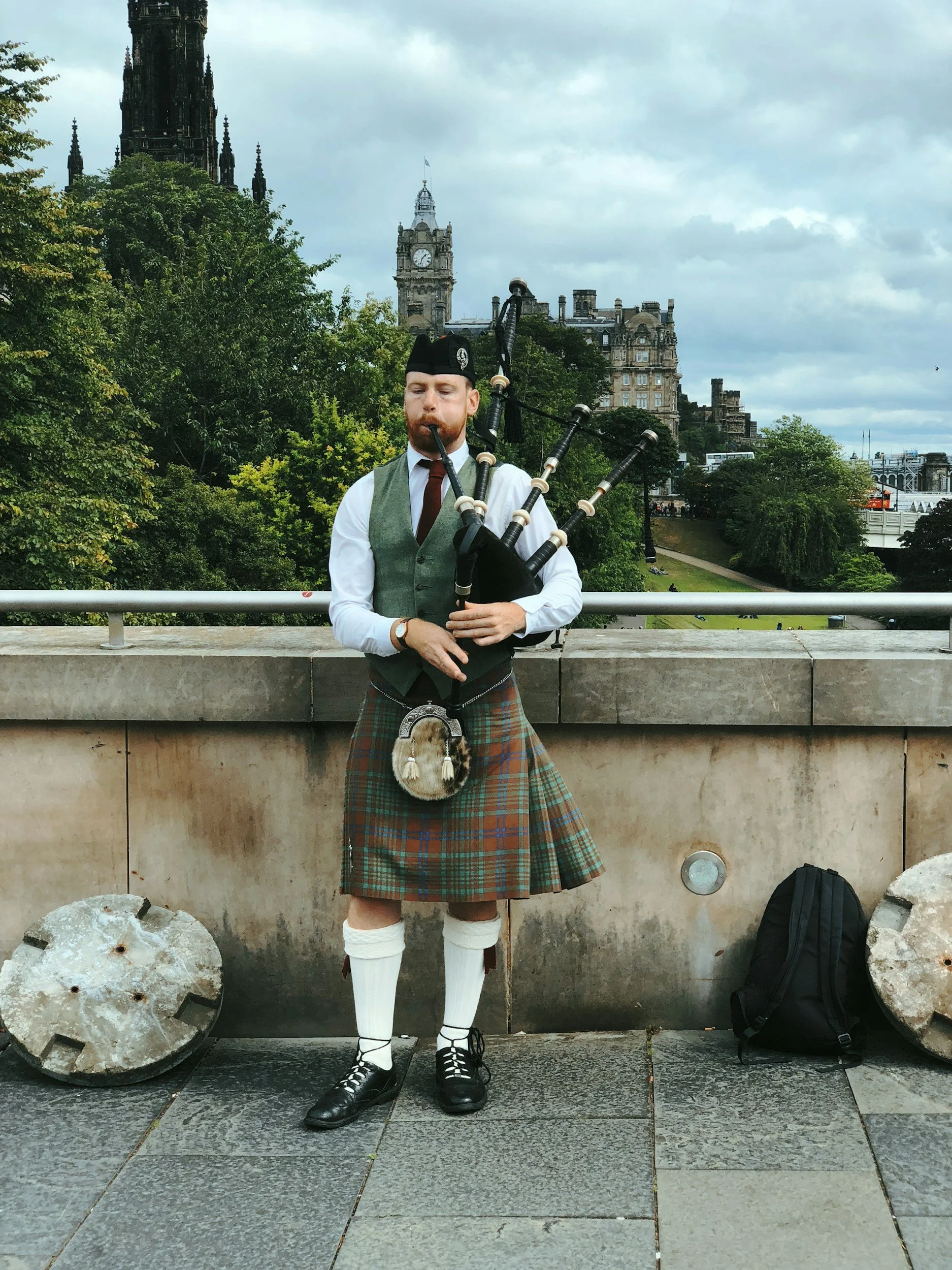 Man playing bagpipes in Scotland