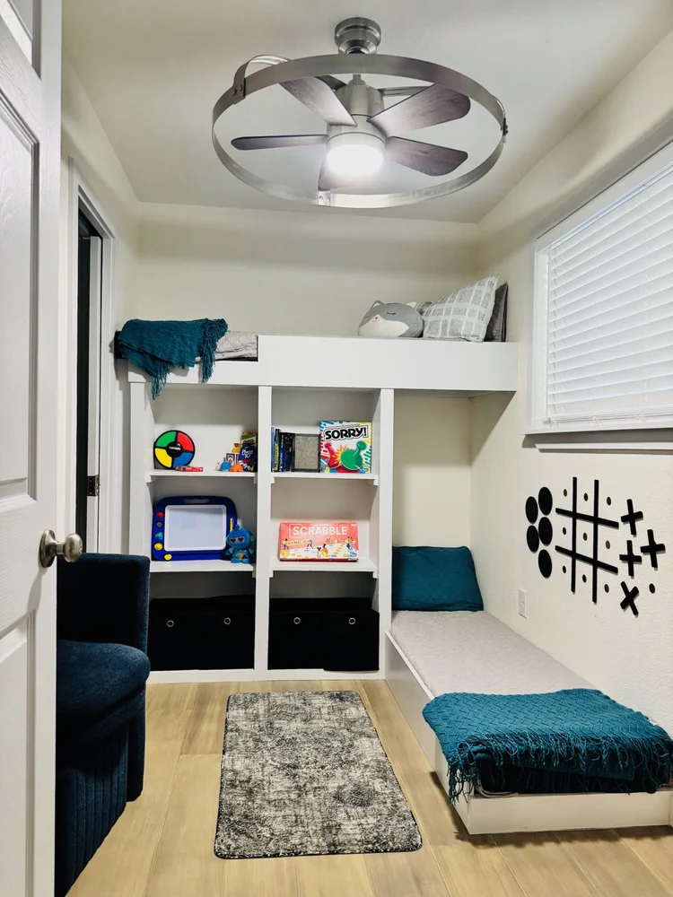 Custom narrow twin bunk beds in the separate small bunk room