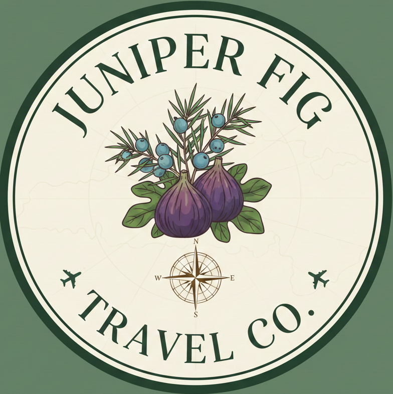 A circular travel company logo for Juniper Fig Travel Co., featuring illustrations of purple figs, juniper berries, leaves, a compass rose, and two small airplane icons on a green background.