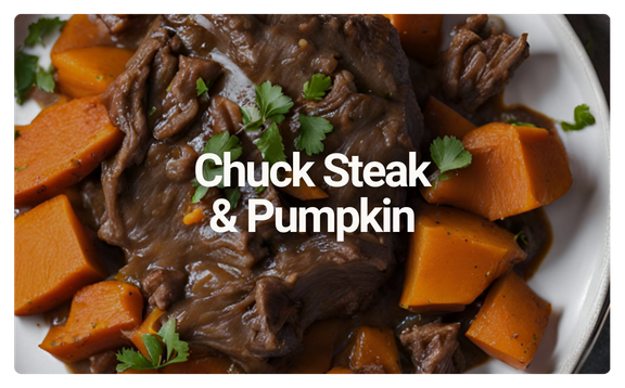 A plate of chuck steak and pumpkin with garnished fresh cilantro.