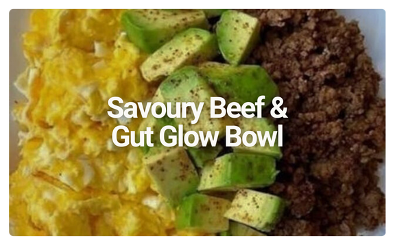 A bowl containing scrambled eggs, sliced avocado, and cooked ground beef with text overlay that reads "Savory Beef & Gut Glow Bowl."