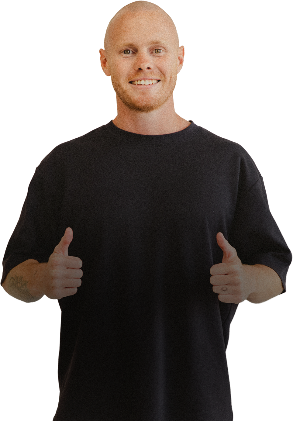 Lachy Oliver wearing a black shirt smiling with 2 thumbs up