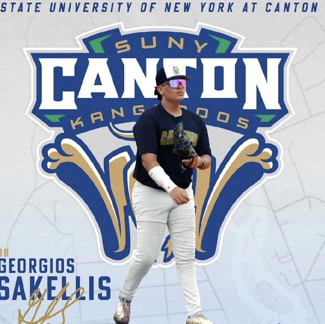 A baseball player standing in front of a large SUNY Canton logo. The player is wearing a black SUNY Canton shirt, white baseball pants, and a black cap with sunglasses. They hold a baseball glove in their left hand and have a white bandage or brace on their right arm. The backdrop features the college's logo and text.