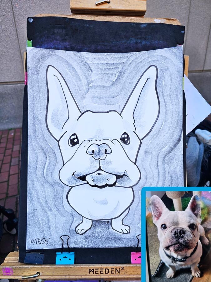 A caricature of a French bulldog is on an easel with a cutout of a photograph of the dog in the lower right corner.