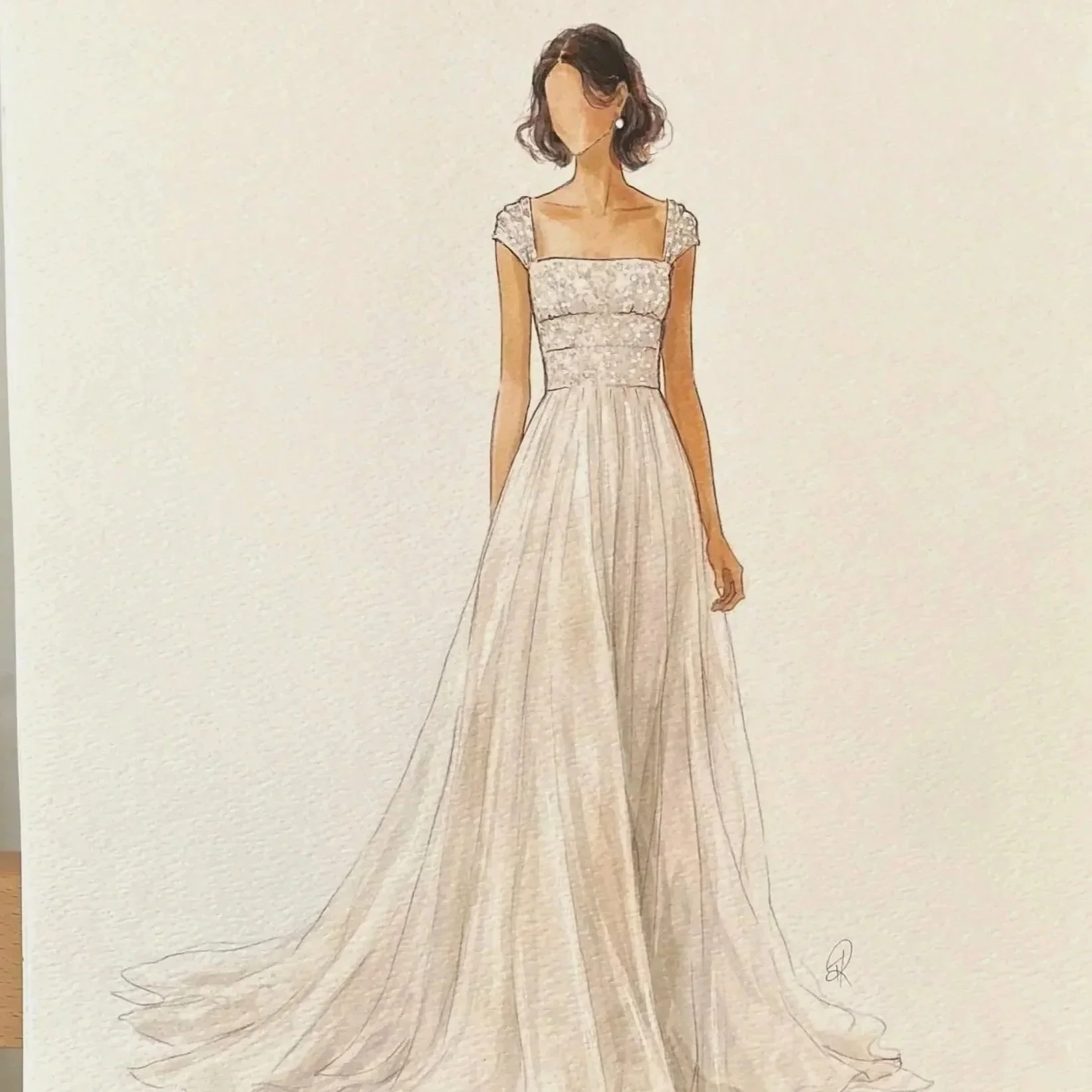 A sketch of a woman in an elegant, floor-length, sleeveless wedding gown with lace details on the bodice and cap sleeves.