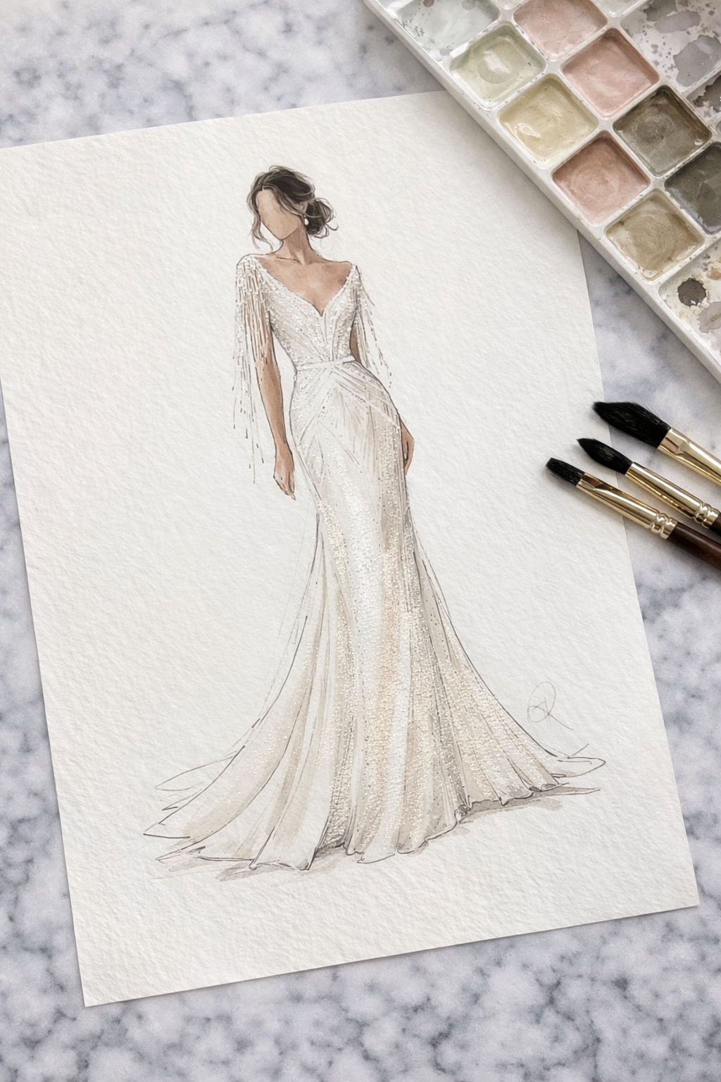 A watercolor fashion illustration of an elegant wedding gown with intricate beading and a flowing train, laid out on textured paper with watercolor brushes and a palette nearby.