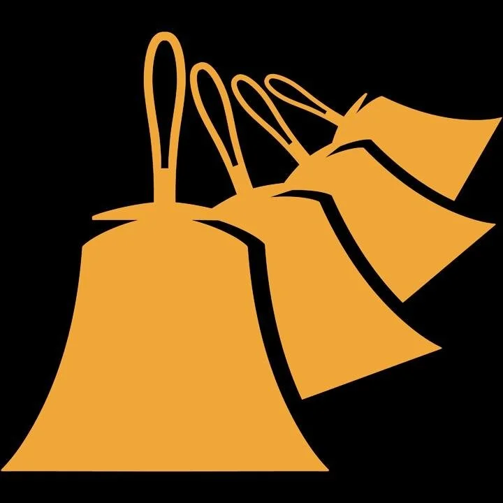 Three gold gift bags with handles against a black background.