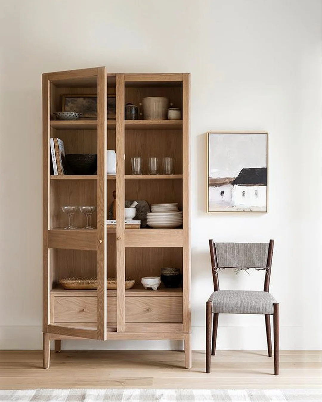 A quiet balance of craft and simplicity 🌿
The Kensington cabinet combines natural wood, clean lines and thoughtful details for a timeless look. An exclusive for McGee &amp; Co.