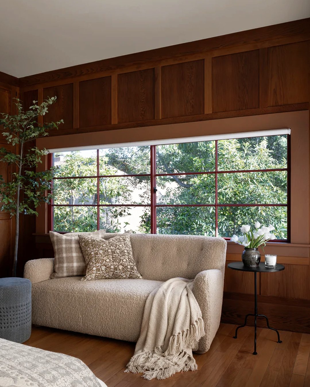 A quiet moment by the window. The Magda Sofa for McGee &amp; Co, styled with warm wood tones for a perfectly cozy corner.
#interiorstyling #interiordesign #cozyhome #softfurnishings #upholsteredfurniture