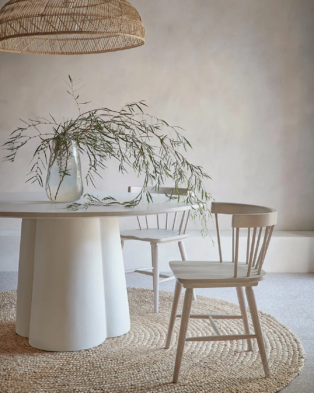 Our Sofia dining table styled beautifully here, paired with warm textures and soft light for a space that feels relaxed and inviting. A low coffee table version exists, as well as wooden versions sold globally.

#diningtable #minimalinterior #diningr