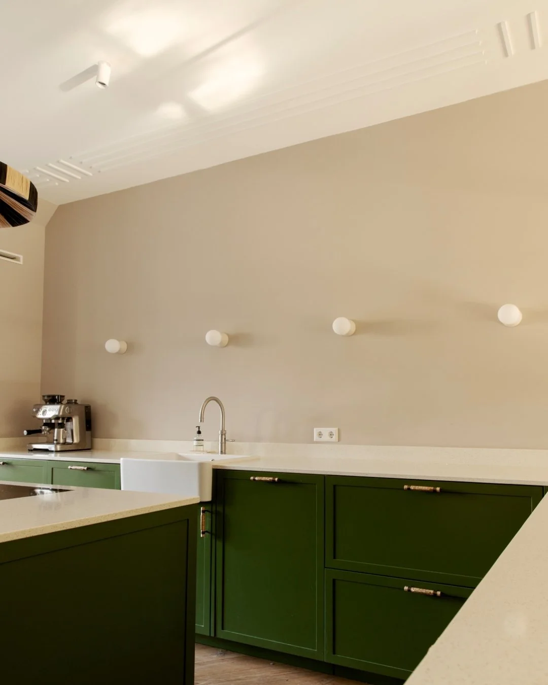 Deep green shades,, sculptural details, and a quiet kind of boldness.

A kitchen designed to feel both refined and unexpected.