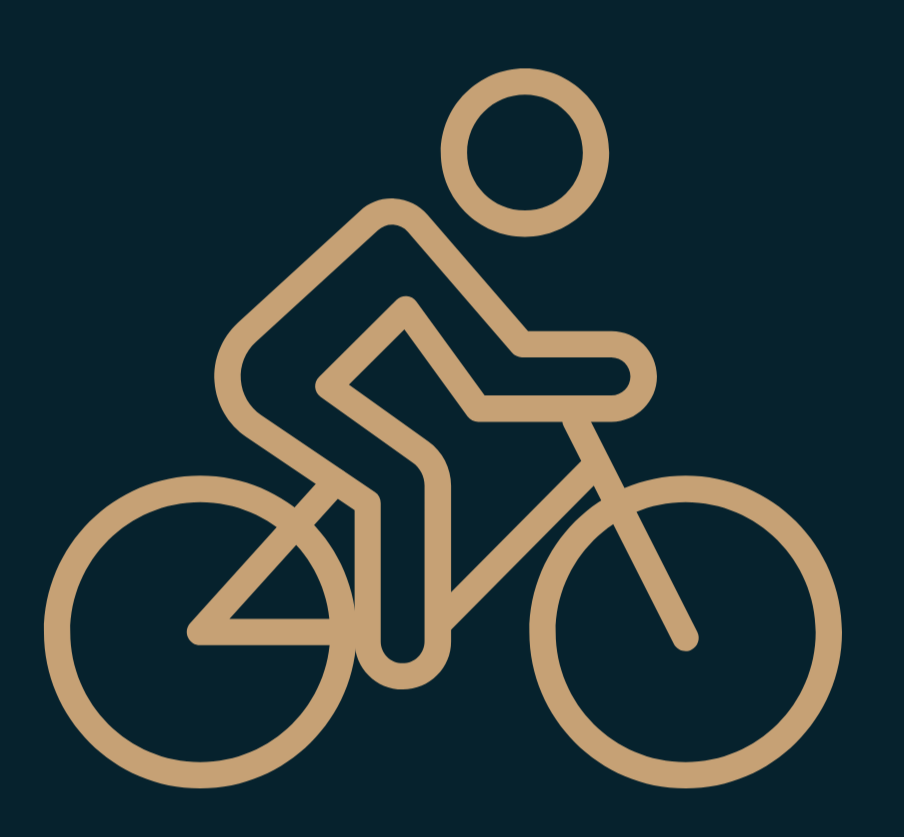 Minimalist line drawing of a person riding a bicycle with a sun or moon in the background.