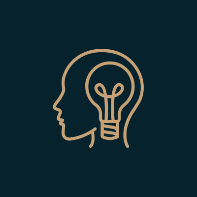 Outline of a human head profile with a light bulb inside representing ideas or creativity.