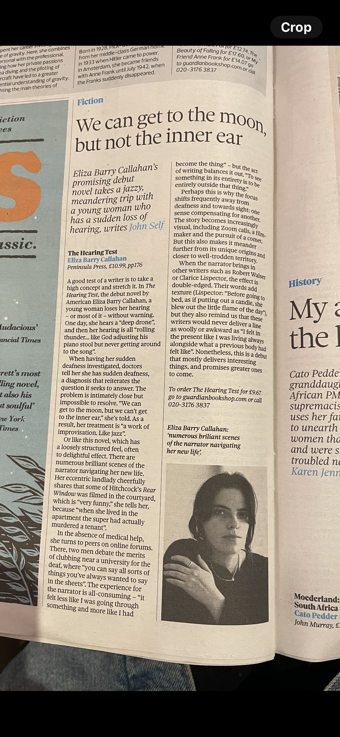 A newspaper article titled "We can get to the moon, but not the inner ear" by Eliza Barry Callahan. The article discusses her debut novel, "The Hearing Test," and includes a black-and-white portrait of the author, Eliza Barry Callahan, showing her wi