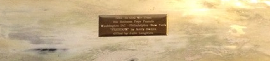 Plaque on a wall.