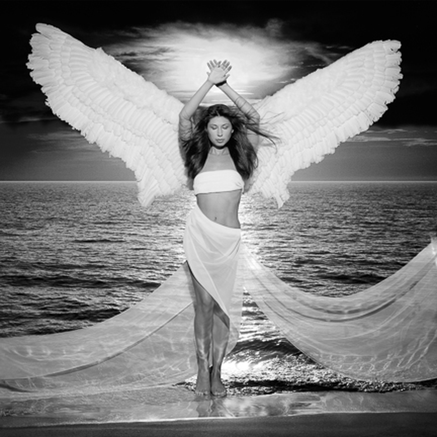 Deliverance by Kerry Swank featuring an angelic figure beside the ocean and light, symbolizing spiritual freedom, faith, healing, hope, strength, and God’s power to guide and restore.