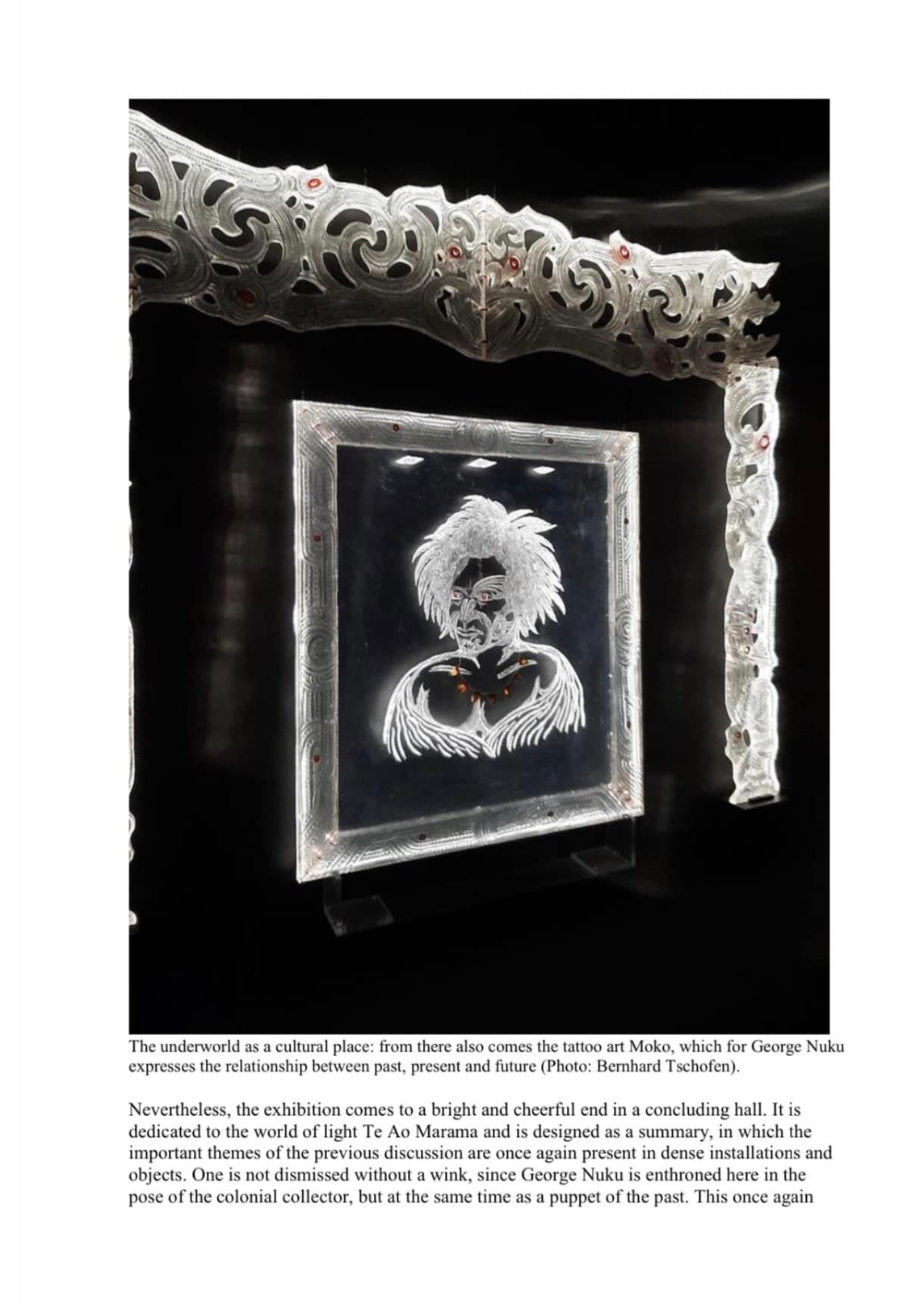 A framed artwork depicting a stylized portrait of a person with white, spiky hair on a dark background, surrounded by a decorative silver border and an ornate silver arch with red accents in a black gallery space.