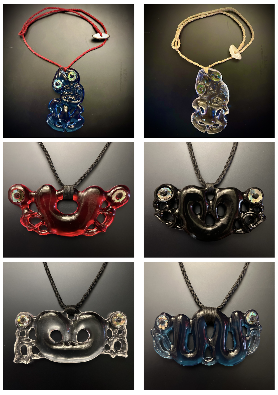 Six glass pendants with intricate designs, each attached to a cord necklace. The pendants feature abstract, openwork patterns, some with iridescent details, in various colors including blue, red, black, clear, and multicolored, displayed on a dark background.