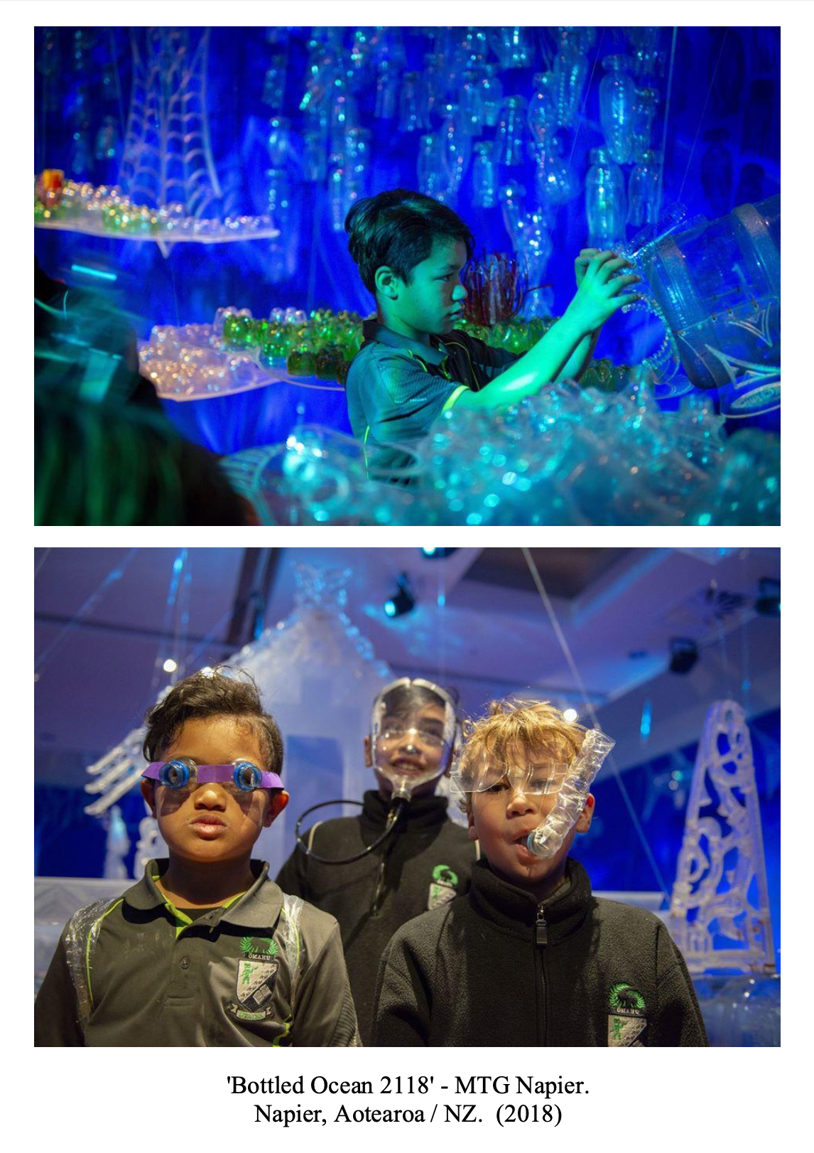 Children exploring an interactive ocean-themed exhibit with glowing, translucent decorations, illuminated in blue and green lighting, at 'Bottled Ocean 2118' in Napier, New Zealand, 2018.