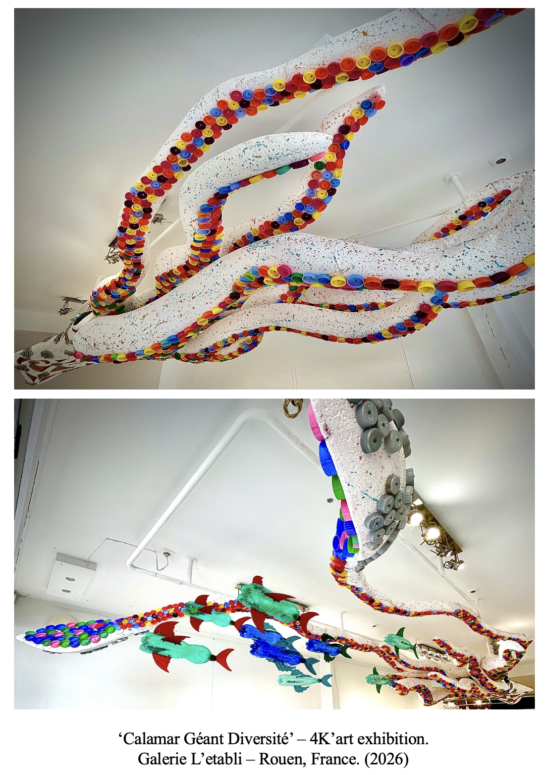 Colorful installation of large, abstract sea creatures, including a giant squid covered in multicolored caps and fish, made of various materials, displayed on the ceiling of a gallery.