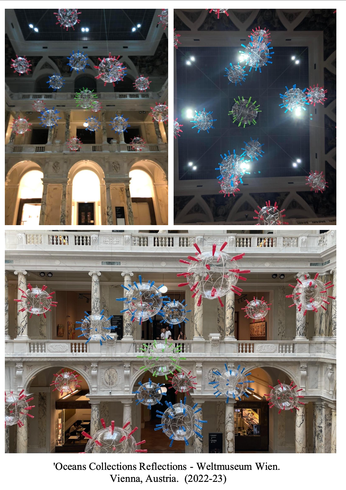 Multiple glass sculptures resembling viruses, suspended from ceilings in an art installation. The sculptures are decorated with colorful spikes in red, blue, and green, and are displayed within a grand, historic building with marble columns and ornate architectural details. The installation is titled 'Oceans Collections Reflections' at the Weltmuseum Wien in Vienna, Austria.