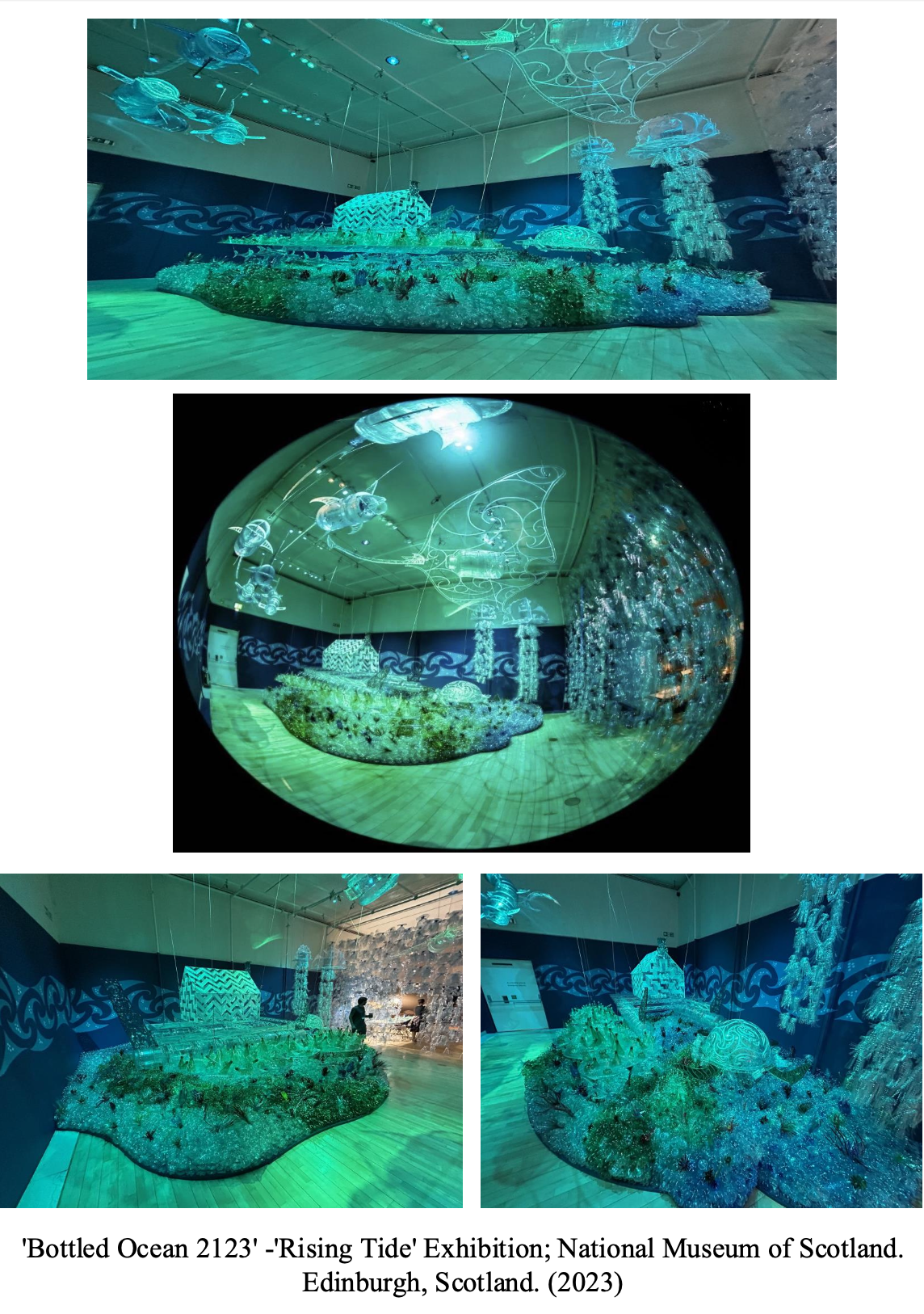 Installation art titled 'Rising Tide' inspired by the ocean, featuring illuminated glass sculptures and intricate wireframe designs representing marine life, displayed in a museum gallery with a wooden floor and dark blue ocean-themed wall mural.