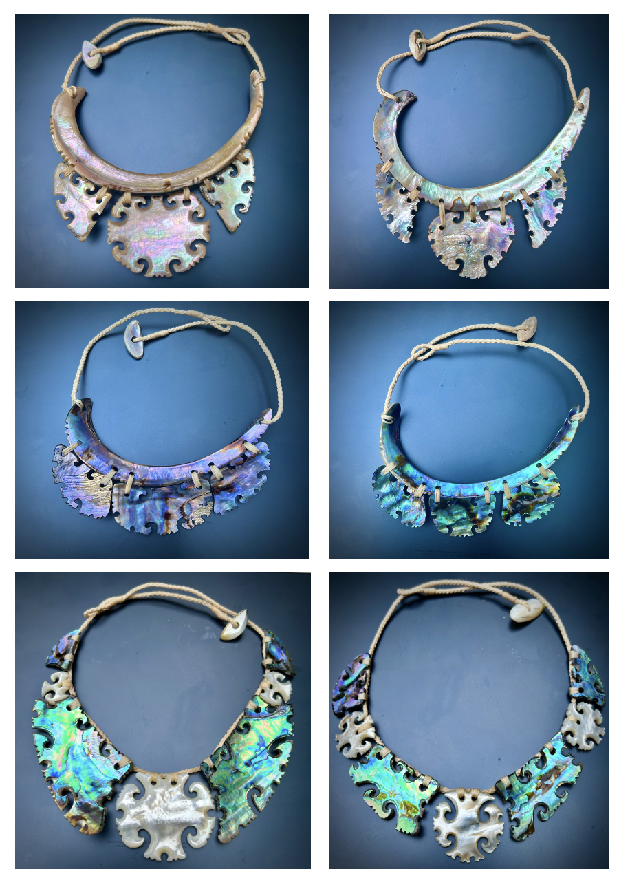 Collection of six pearl necklaces with carved shells, each with a variety of designs and colors, displayed on a blue background.