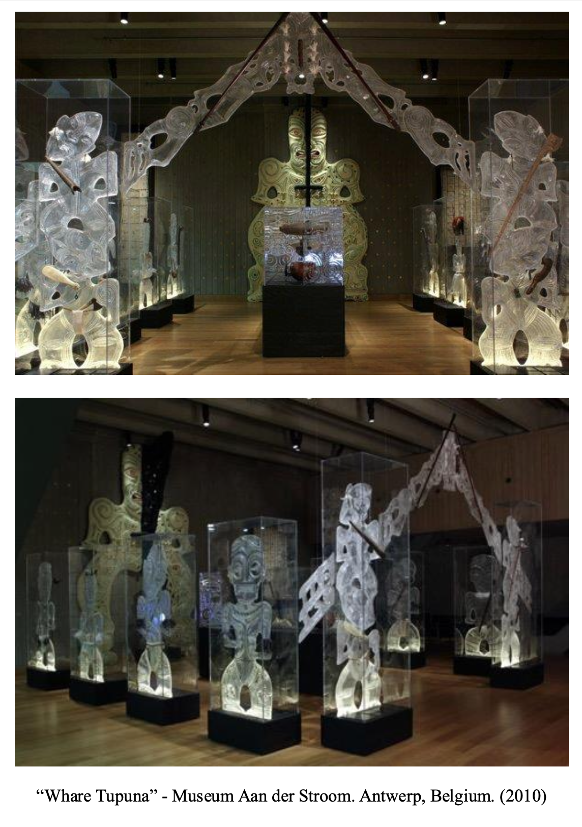 Exhibit at Museum Aan de Stroom in Antwerp, Belgium, titled 'Whare Tupuna,' featuring traditional carved figures and masks displayed inside glass cases.