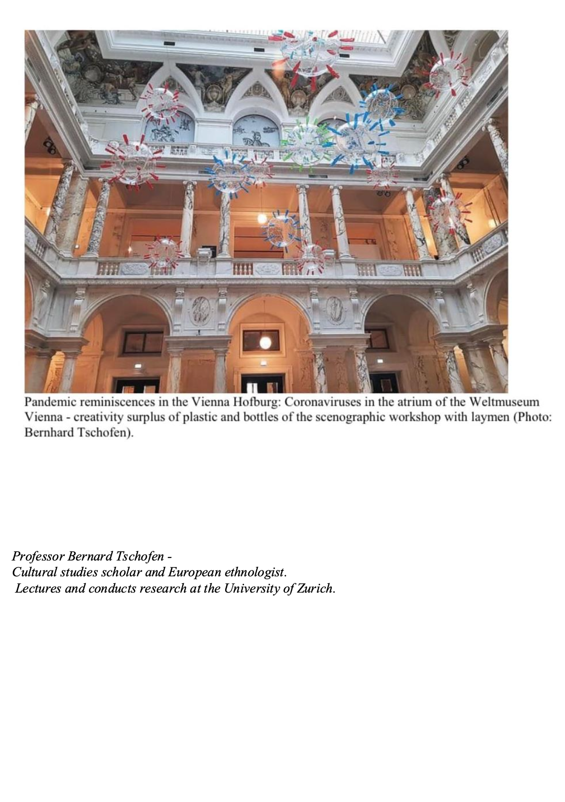 Decorations resembling viruses hanging from the ceiling in the atrium of the Vienna Hofburg, symbolizing pandemic remnants.