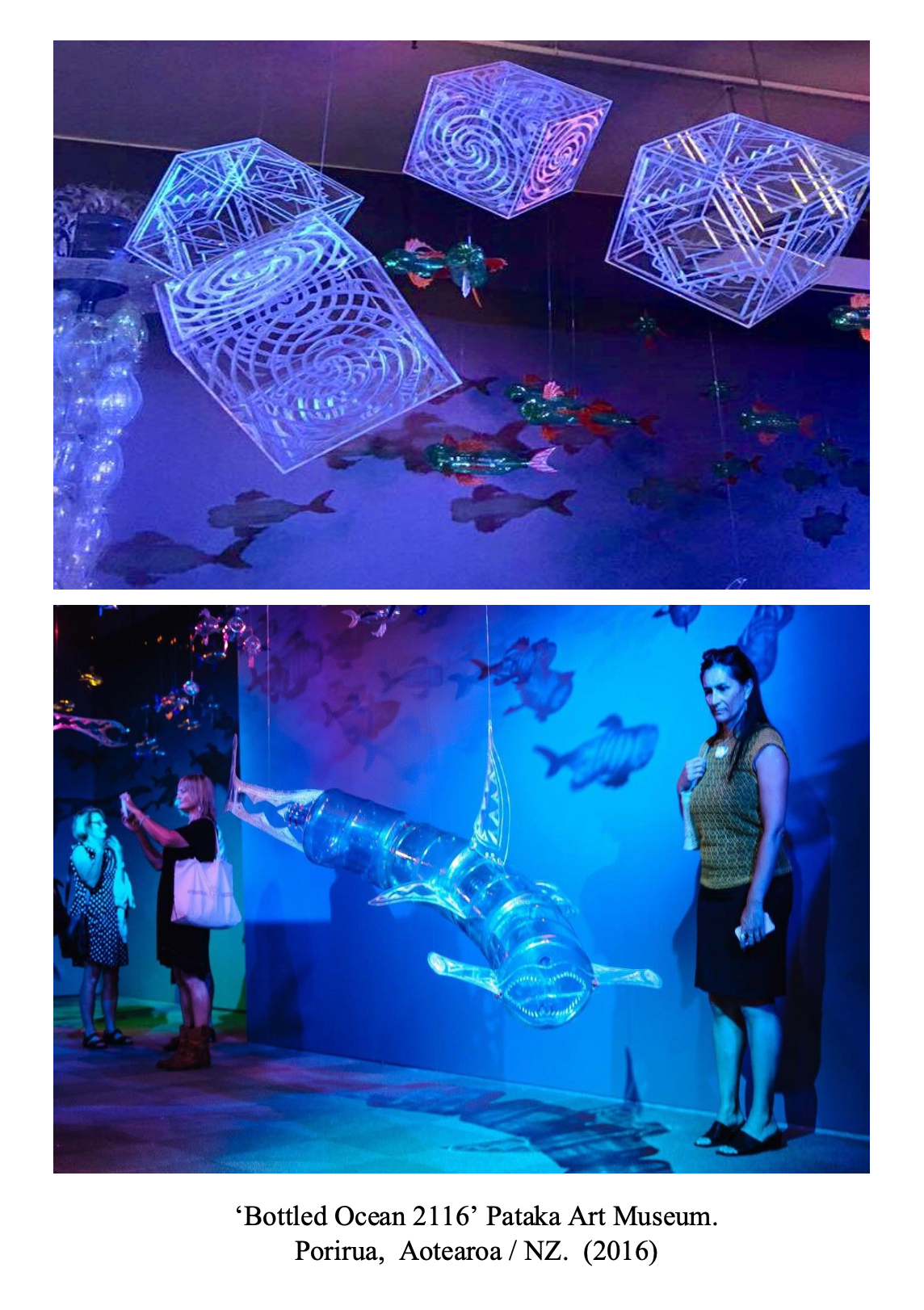 Art installation at Pataka Art Museum, titled 'Bottled Ocean 2116', showing illuminated jellyfish sculptures and hanging geometric shapes, with visitors observing.