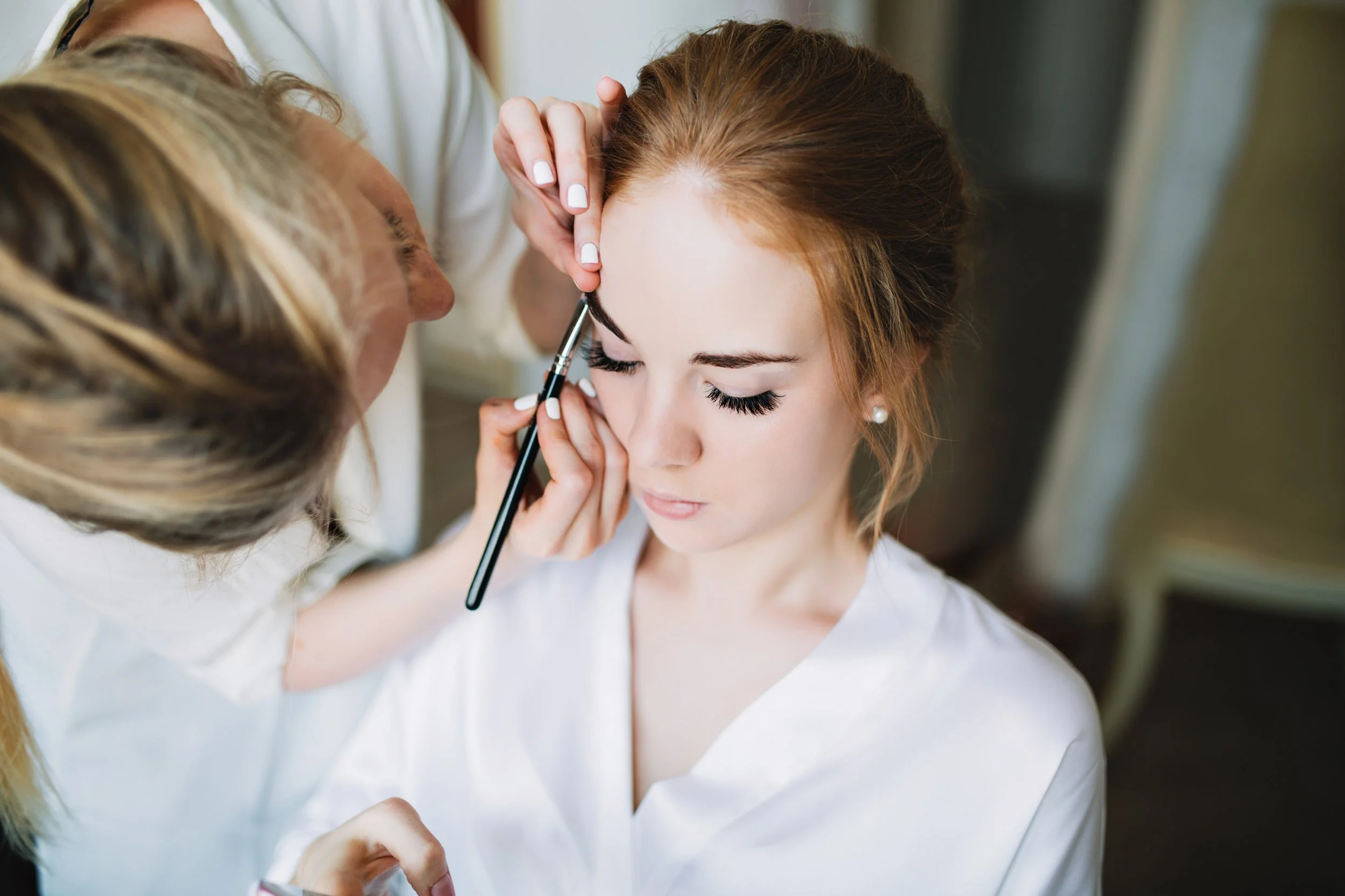 portrait-preparation-bride-morning-before-wedding-artist-makes-makeup-she-keeps-eyed-closed.jpg