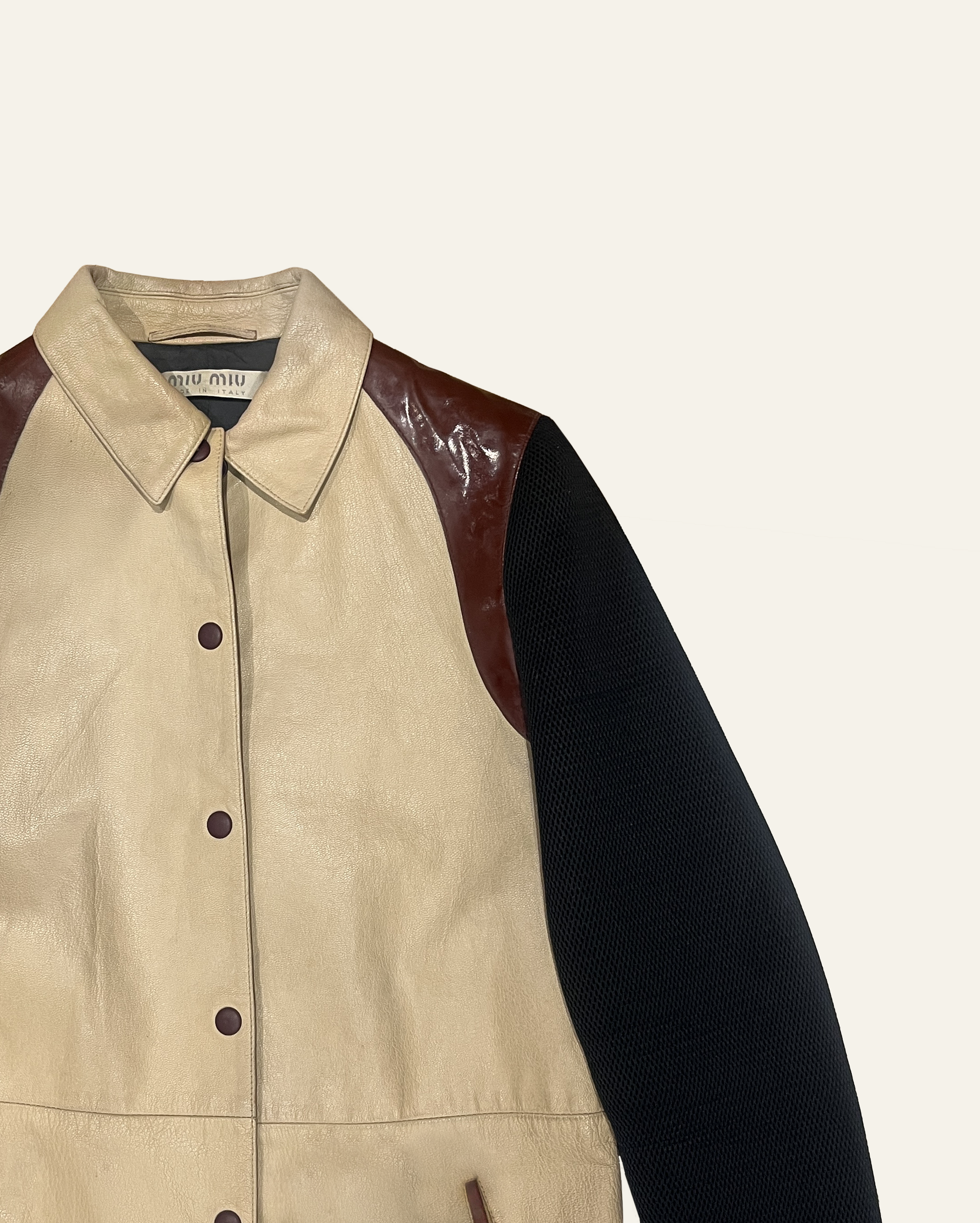 Miu_Miu_ss2000_leather_mesh_coat.png