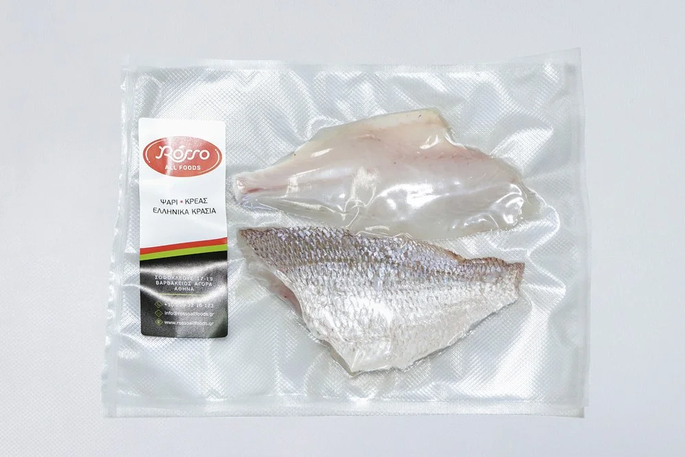 Vacuum-sealed package of two fish fillets, one with skin and one without, from Greek food brand JORO.