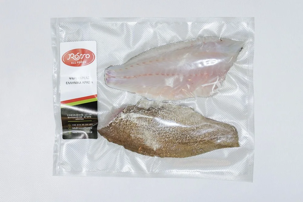 Frozen fish fillets in vacuum-sealed packaging with a label from Rosso All Foods.