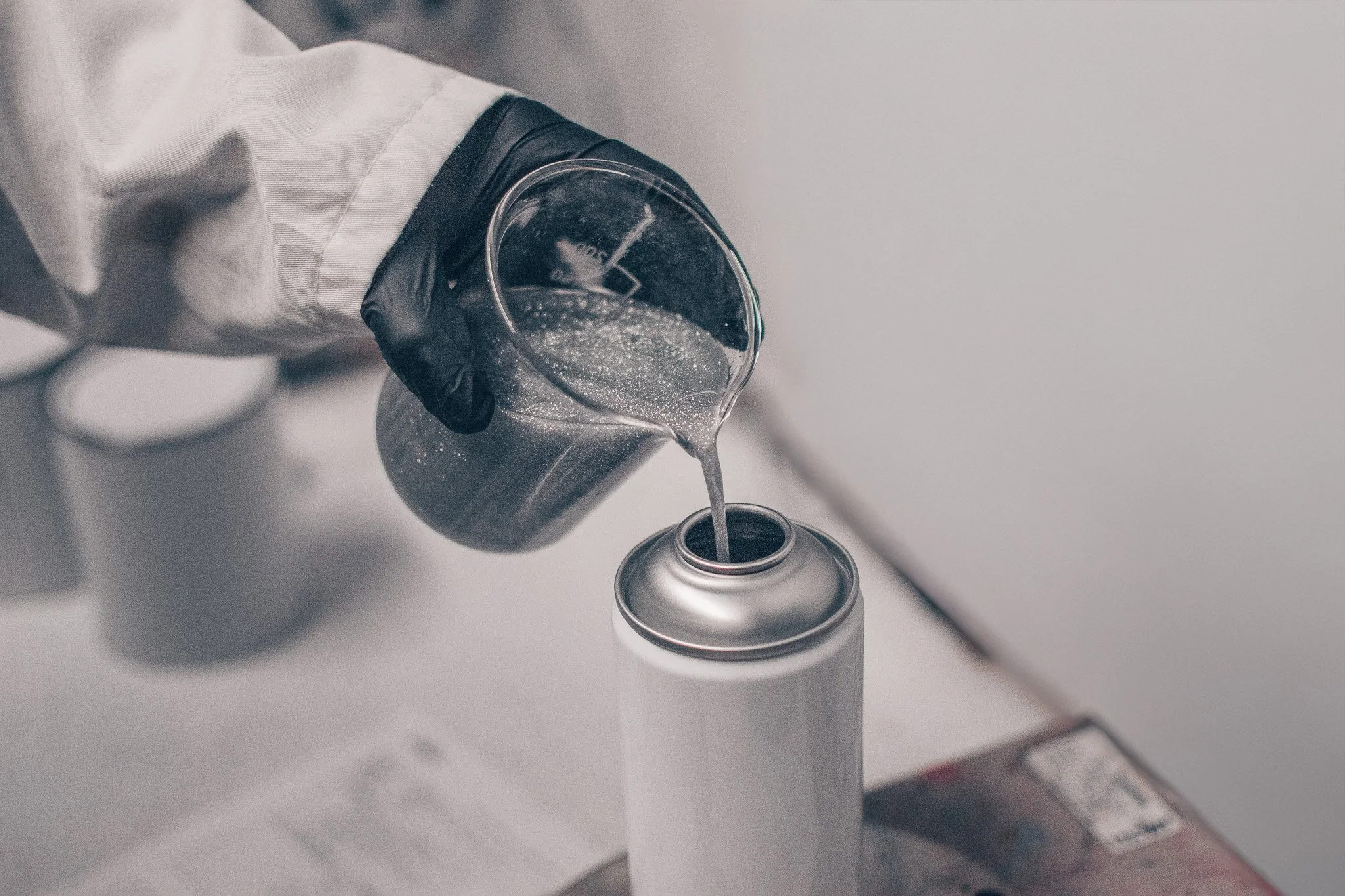 Silver Glitter Poured into Aerosol
