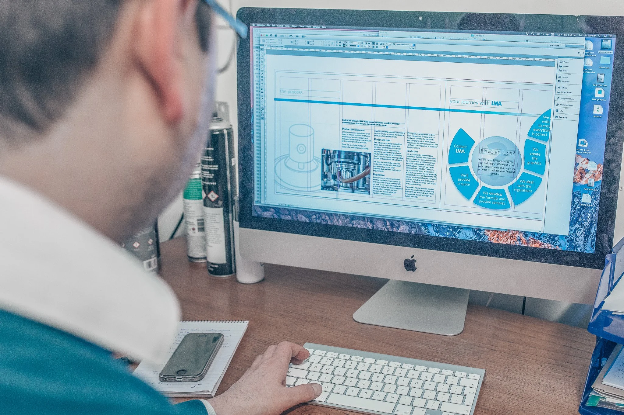 Graphic Designer Editing Brochure