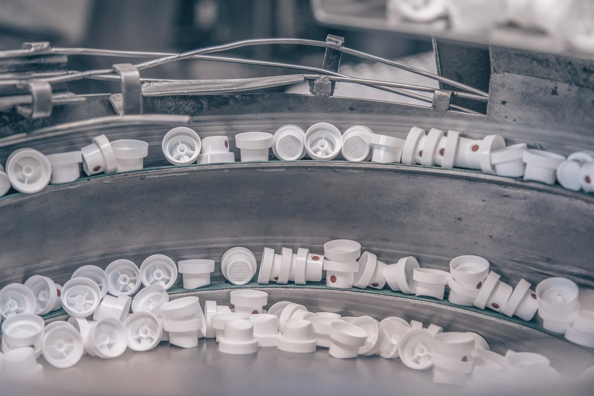 Image of aerosol actuators in sorting machine