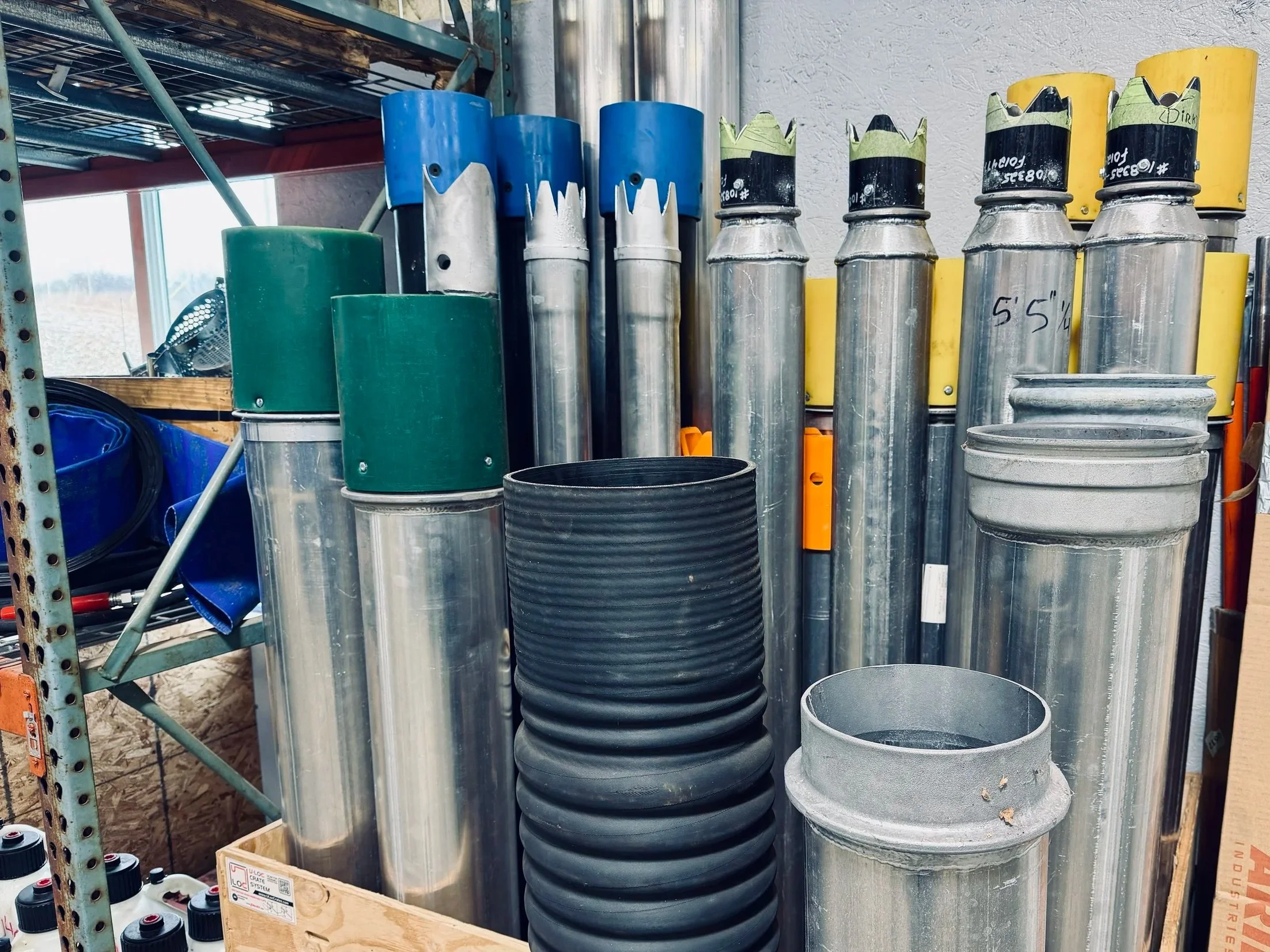 Various sizes and colors of replacement boom tubes and dig tubes for vac trucks available for sale at the 502 Equipment service center in Oldham County, KY