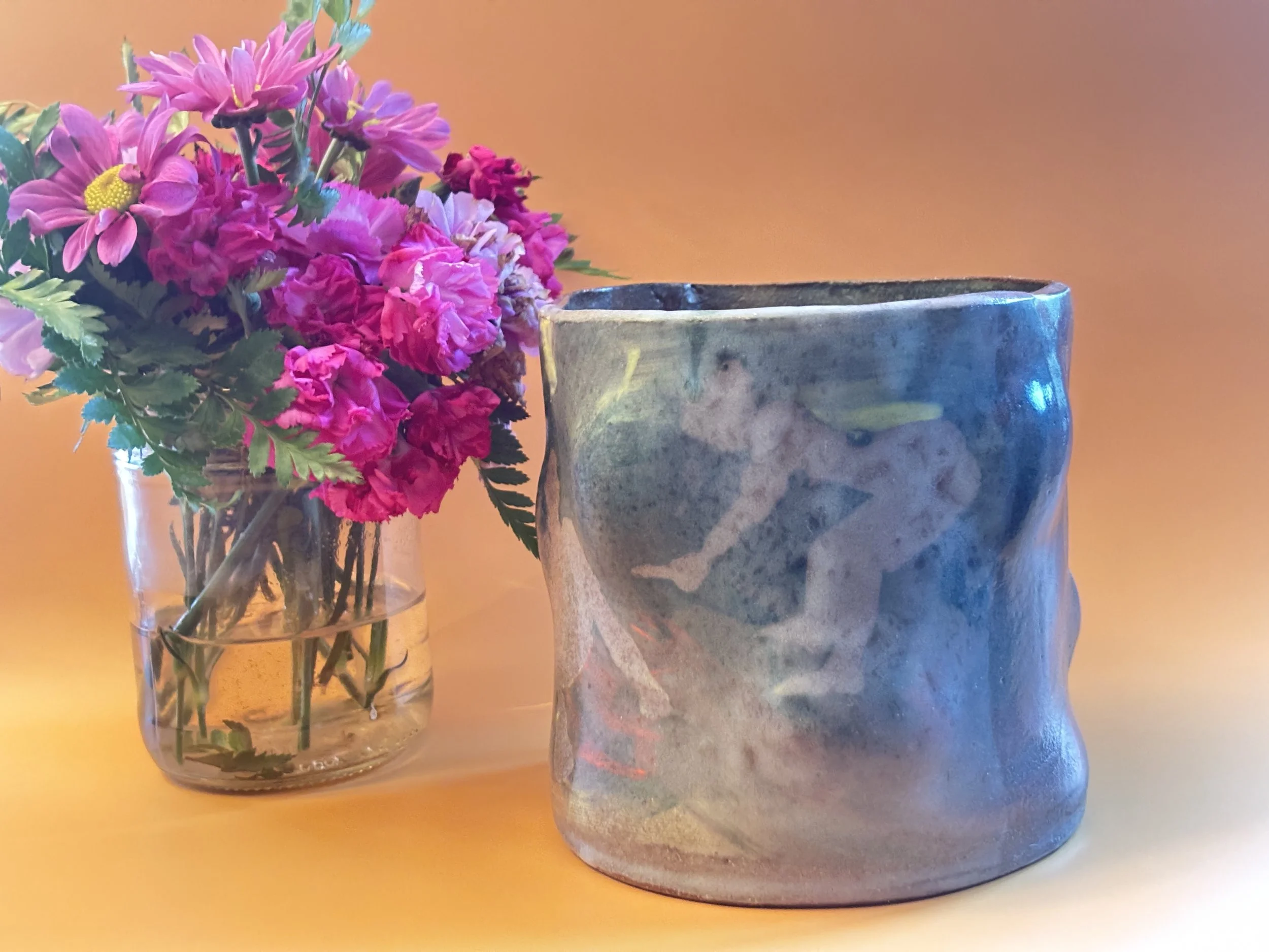 silhouette image on glazed vase