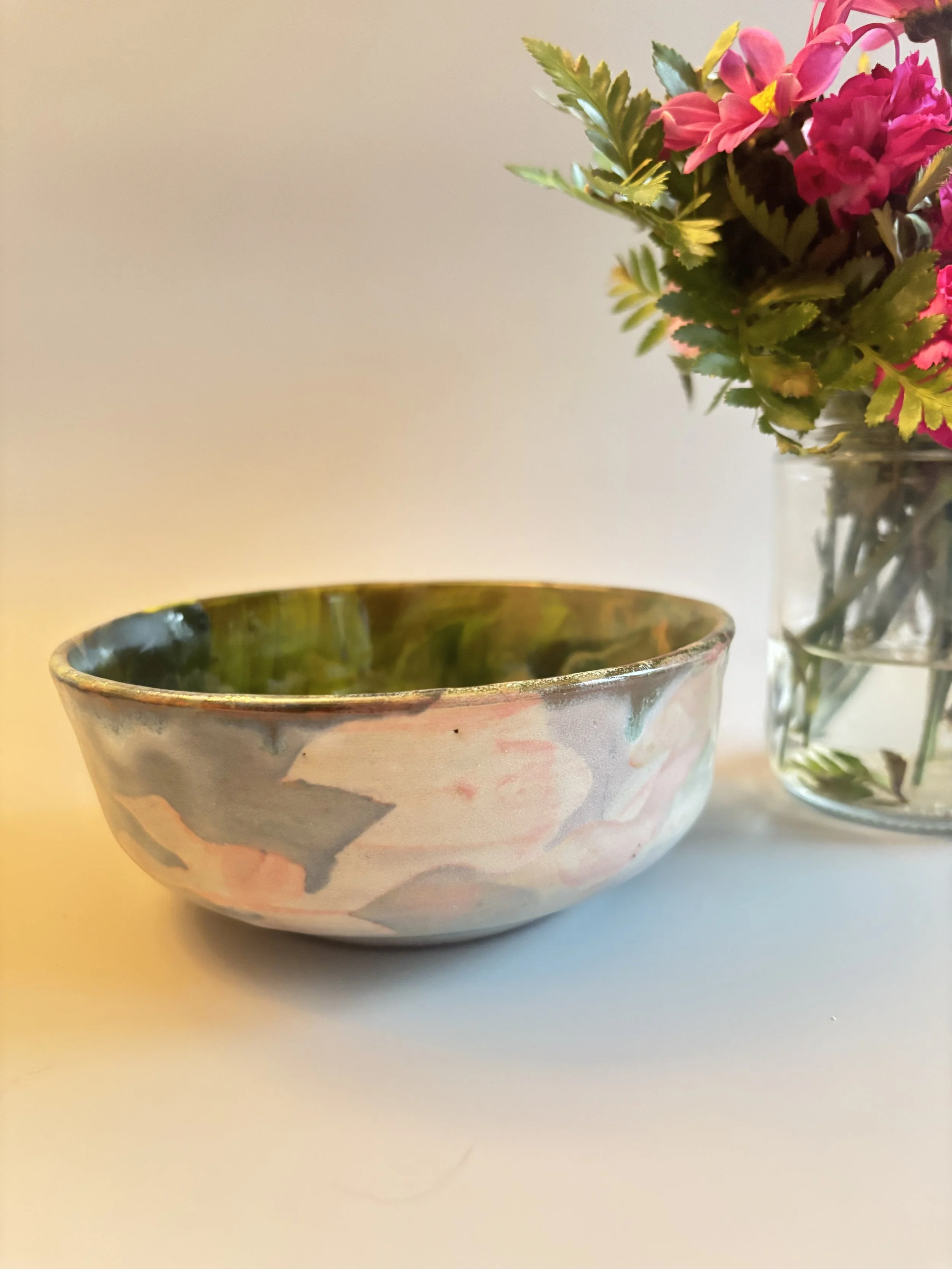 glazed bowl with silhouette cut outs