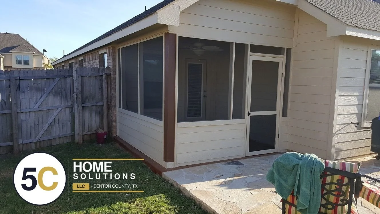 Screened-in patio built with lap siding painted to match the home