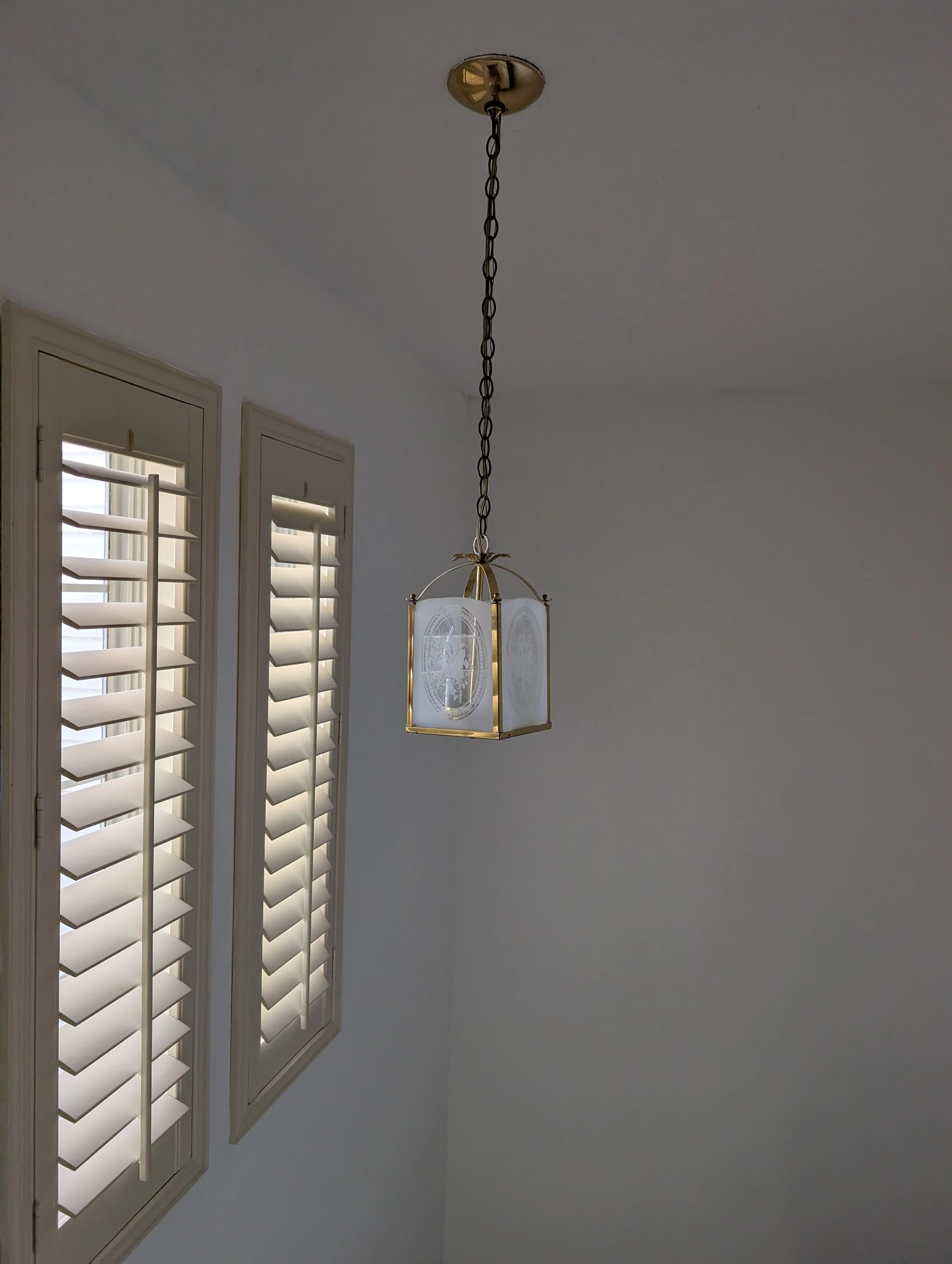 Stairway chandelier replaced in Lewisville, TX - Before