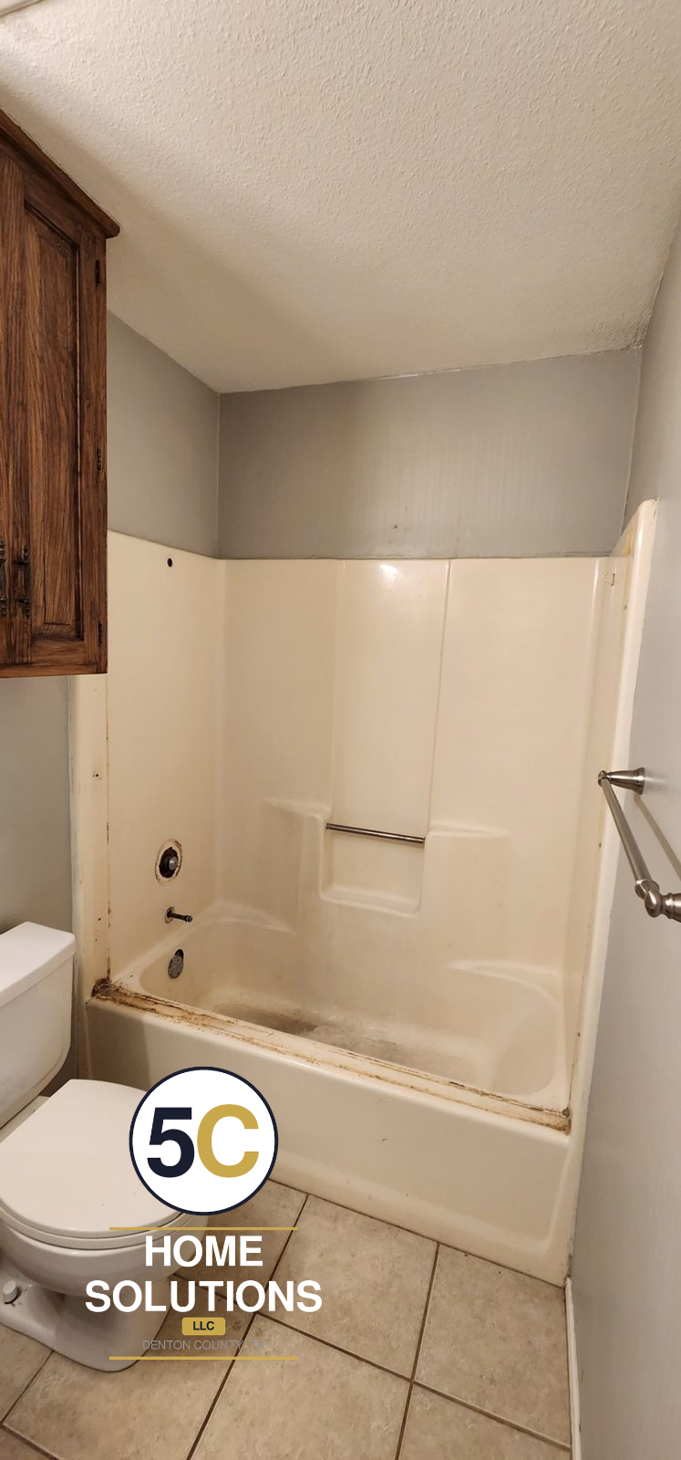 Before: stained, worn fiberglass tub and shower surround, Denton County TX