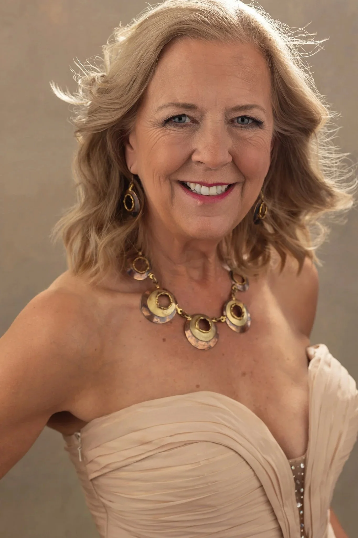 WOMEN BACLIT GOLD DRESS HAIR BLOWING PORTRAIT STUDIO SHREWSBURY