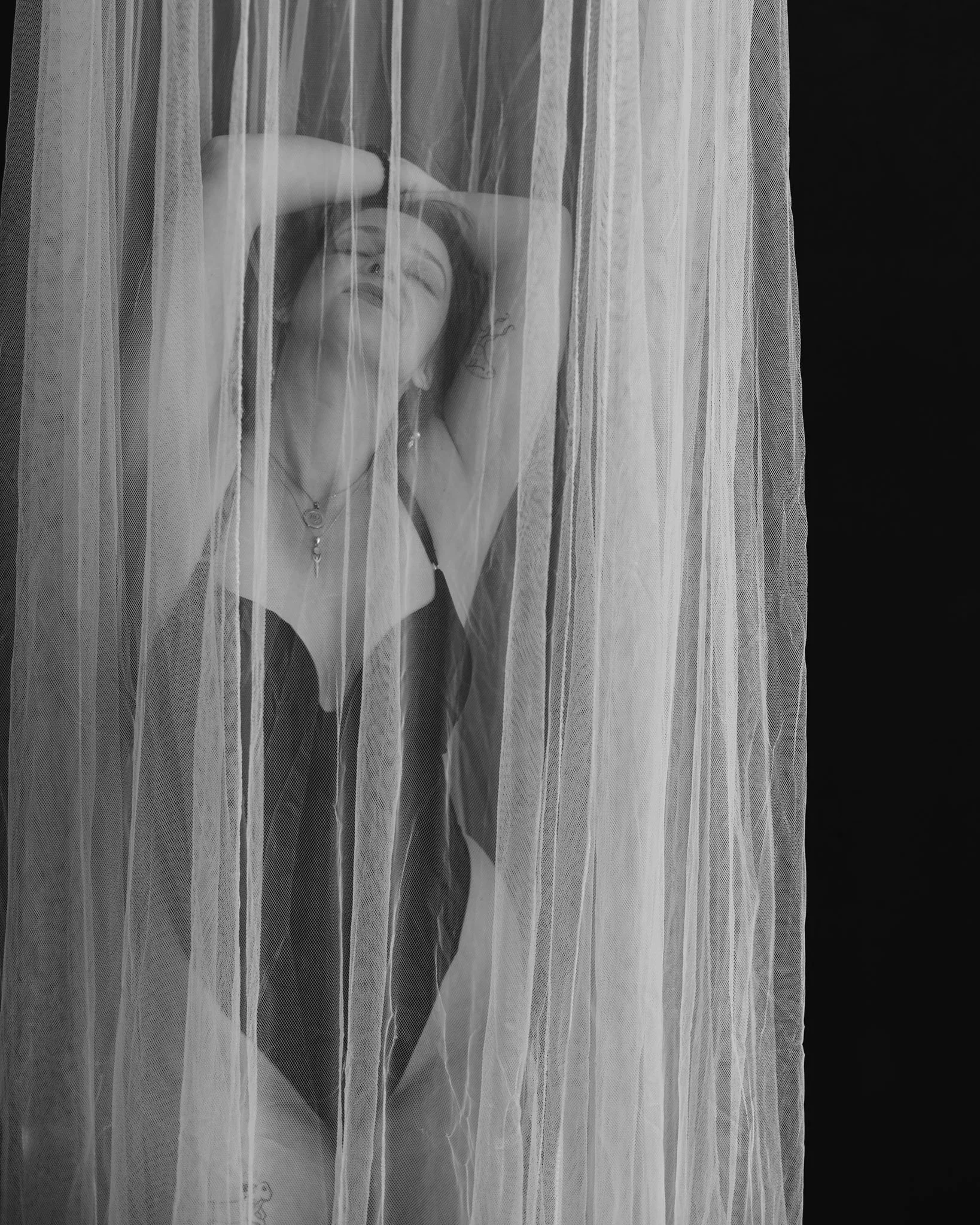 "Beautiful lighting of woman in dramatic pose in Shrewsbury studio"