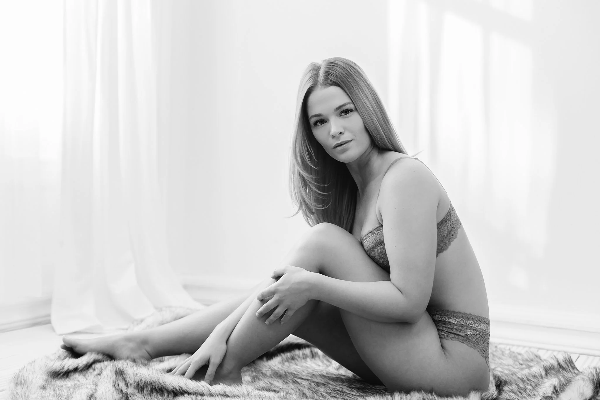 "Luxury boudoir seated pose in Shrewsbury studio"